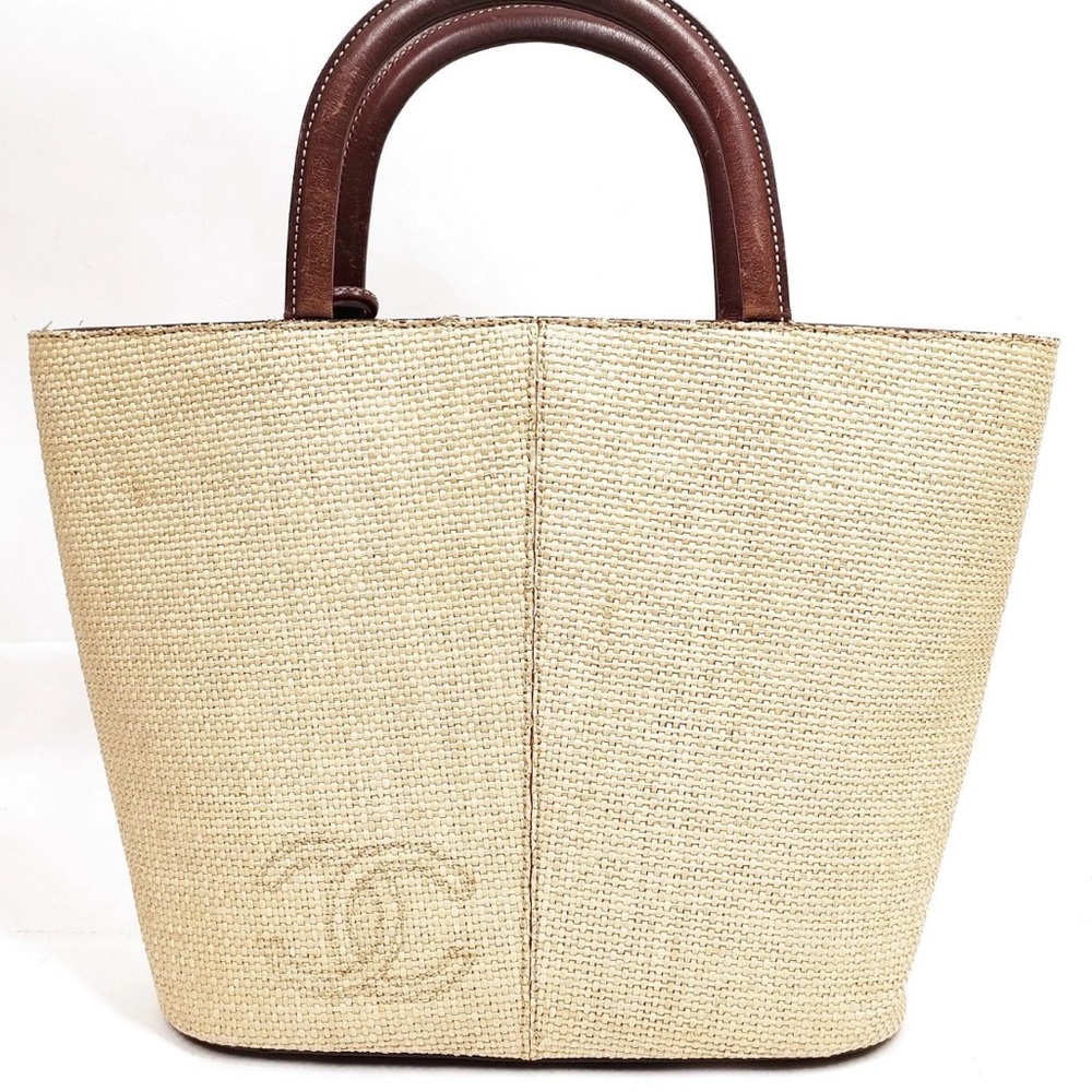 CHANEL Beige Straw Tote with Brown Leather Handles